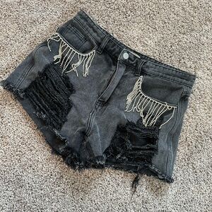 Fringe denim shorts.